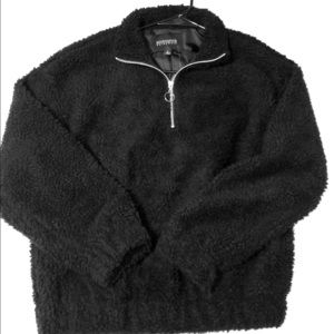 black furry half-zip jacket